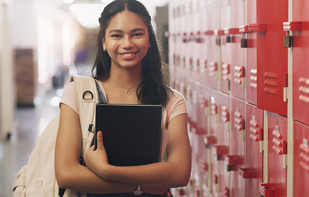 girl in scholl with books